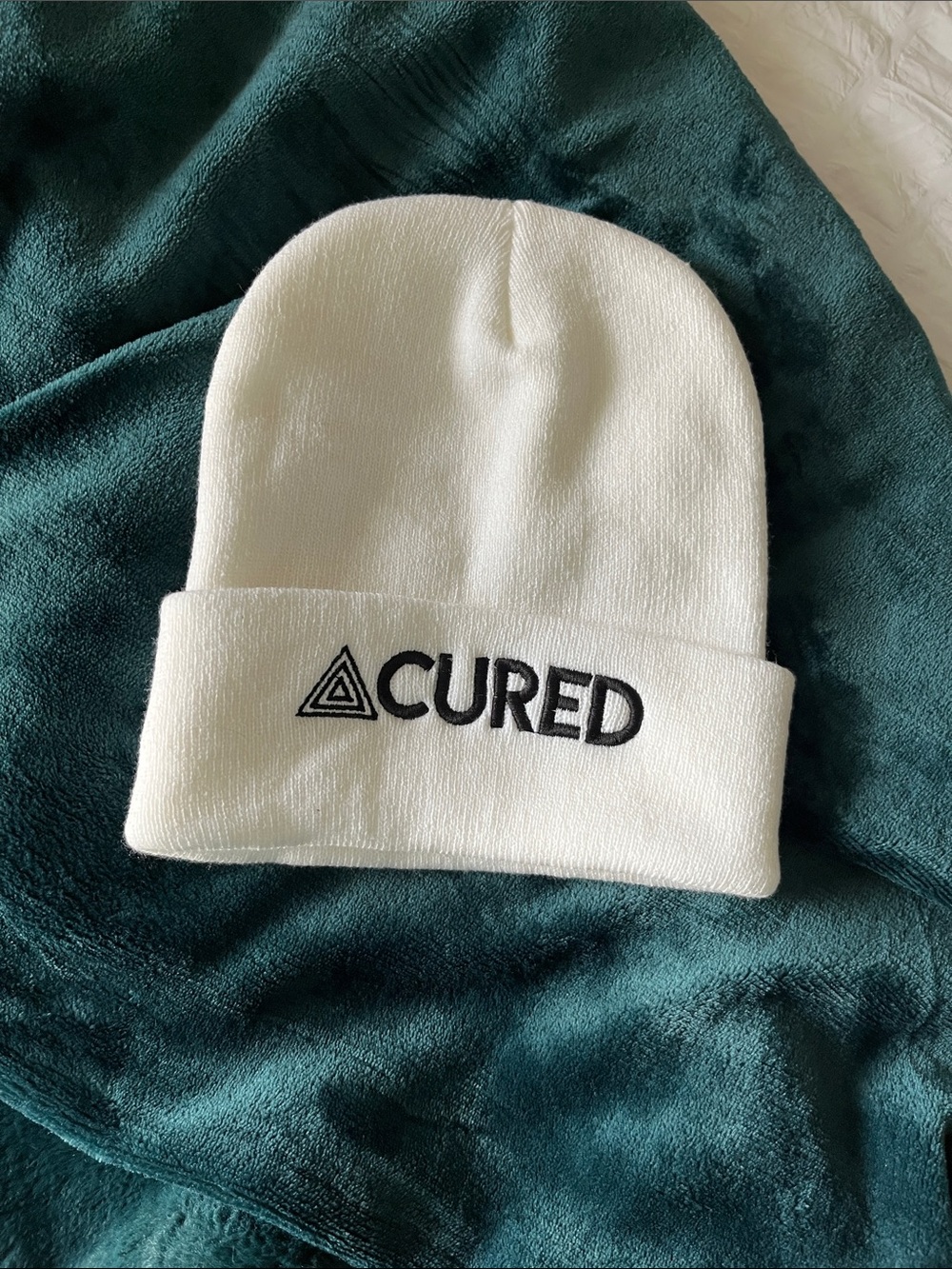 Cured nutrition white beanie